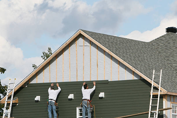 Professional Siding technician working in Traphill, NC